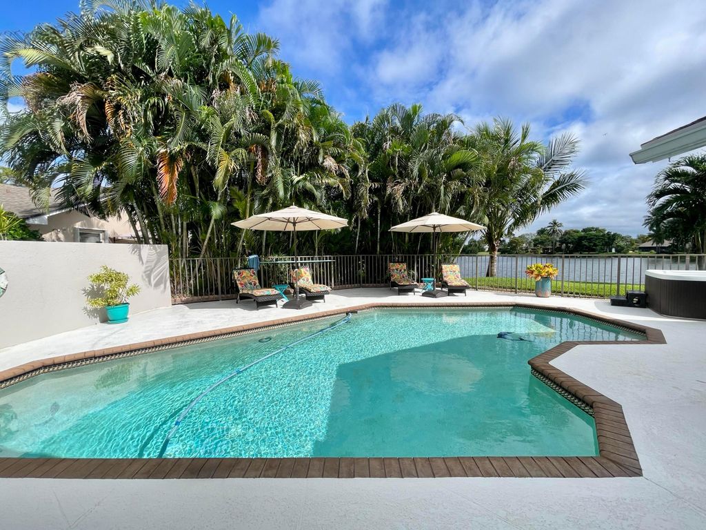 Photo of 187 Parkwood Drive, Royal Palm Beach, FL 33411 (MLS # R11128660)