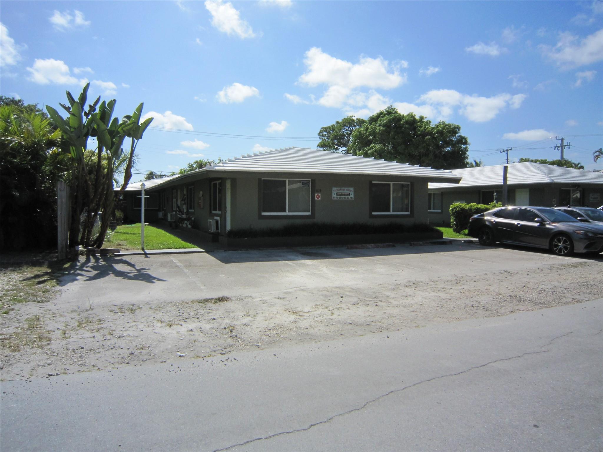 Excellent location and well maintained residential income property. 4 1 bed 1 bath units, 1 efficiency and a 2 bed 1 bath unit. Separate laundry room for additional income, impact windows. Good for owner occupied or Airbnb. Close to the beach and downtown. Separate electrical meters, owner pays water, sewer and garbage.
