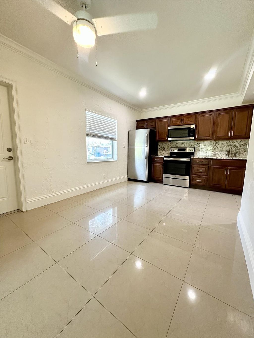 Photo of 1037 NE 16th Avenue #W, Fort Lauderdale, FL 33304 (MLS # F10500057)