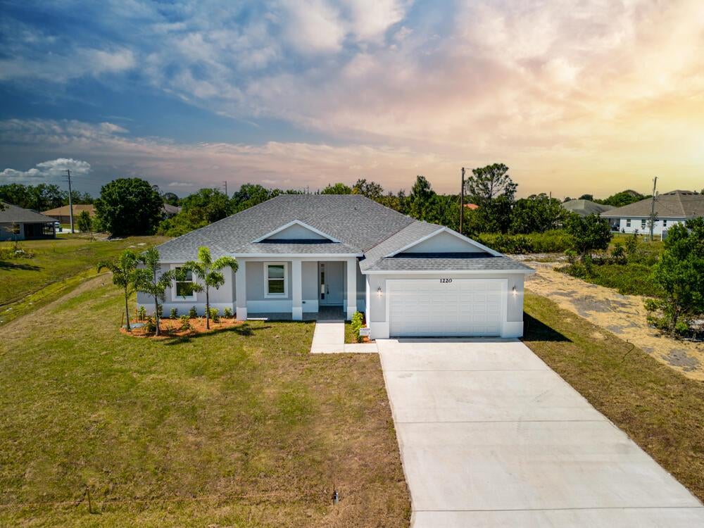 Photo of 1881 SW Lewis Street, Port St Lucie, FL 34953 (MLS # R10881217)