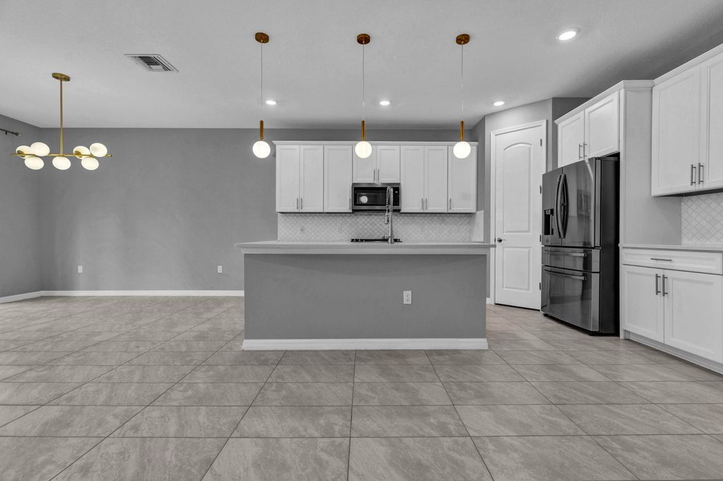 Photo of 8296 Vaulting Drive, Lake Worth, FL 33467 (MLS # B26033635)