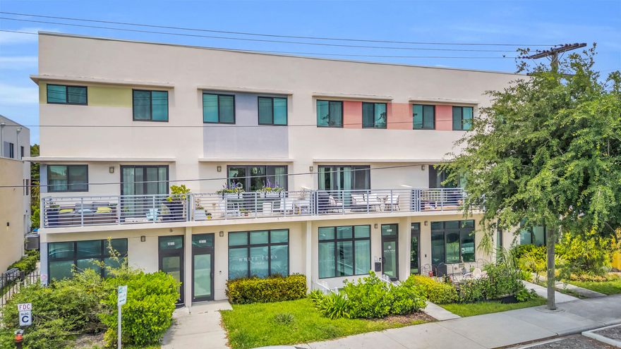 Opportunity knocks just minutes from the beach in the heart of vibrant Downtown Lake Worth Beach, where coastal charm meets everyday convenience. Enjoy the rhythm of seaside living with ocean breezes, swaying palms, and walkable access to vibrant local shops, dining, and entertainment. Built in 2018, this modern townhome offers 2 bedrooms, 2.5 bathrooms, and 1,632 square feet of thoughtfully designed living space. A rare mixed-use lower level provides exceptional flexibility and may be used to run a business, offering a unique income opportunity in a highly sought-after location. Inside, the home features a light and airy coastal aesthetic with newer kitchen appliances, updated countertops, and fully remodeled bathrooms designed with clean, contemporary finishes.  Impact doors and windows provide added security, storm protection, and energy efficiency, while generous parking makes it easy to welcome guests or business clients. Additional highlights include a private one-car garage and a breezy balcony perfect for morning coffee or sunset relaxation. Police and fire stations are just a block away, with Publix, CVS, Starbucks, City Hall, and Lake Avenue Shops all within a short walk. Enjoy the beautiful beach with a quick bike or golf cart ride away, and don't miss a visit to Benny's on the Beach!  This deed-restricted property includes income qualification requirements, creating a rare chance to own in one of South Florida's most eclectic and desirable coastal communities with built-in flexibility for both living and working.