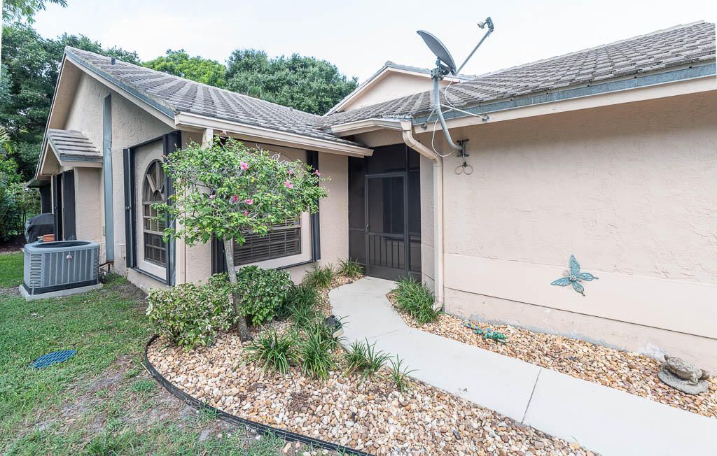 Photo of 10860 Stafford Circle N, Boynton Beach, FL 33436 (MLS # B26042977)