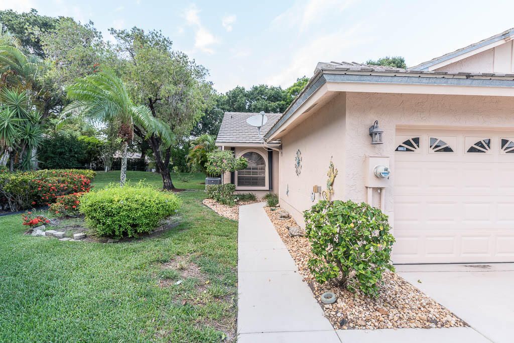 Photo of 10860 Stafford Circle N, Boynton Beach, FL 33436 (MLS # B26042977)