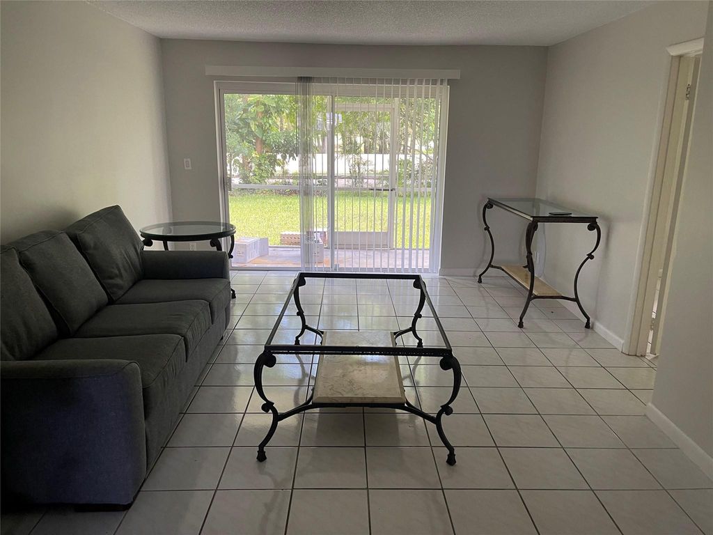 Photo of 8405 NW 61st Street #D-109, Tamarac, FL 33321 (MLS # F10497059)