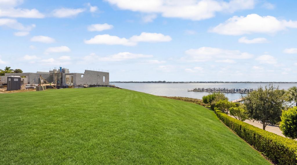 Photo of 1311 NE Langford Lane, Jensen Beach, FL 34957 (MLS # R11161954)