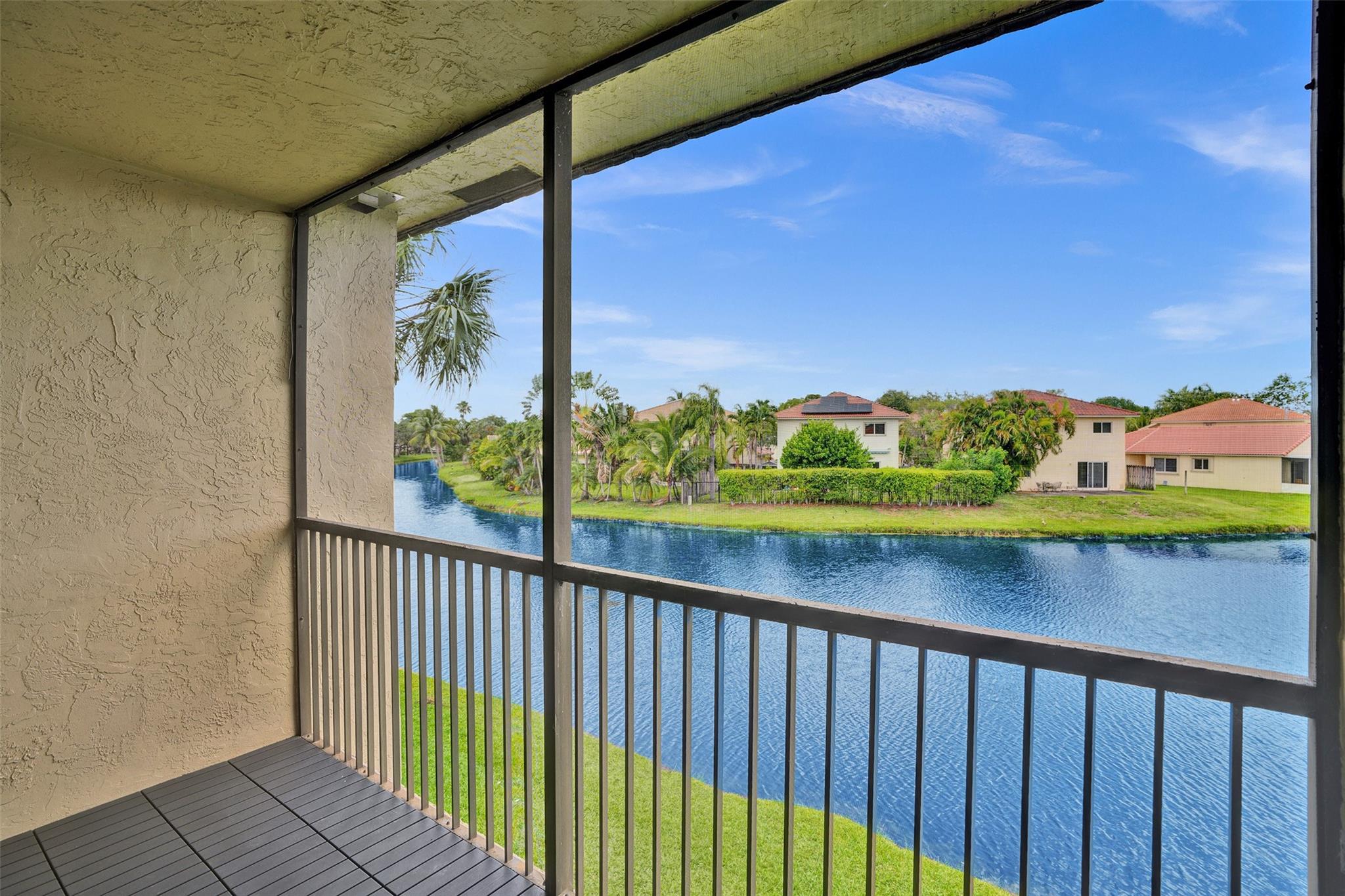 Tired of cookie-cutter condos? This 2-bed 2-bath unit is full of personality, lake views, & just the right touch of “wow.” Sip your morning coffee or evening beverage on 2 screened patios, why settle for one? Open kitchen with stainless steel appliances ready to impress your guests—or at least heat up leftovers in style. Hurricane impact windows & doors for peace of mind, while the bonus storage room gives your stuff a proper home. Reserved parking is right outside, & there's plenty of guest parking when friends drop by (& they will). For the active types— Bonaventure Town Center Club (mandatory membership $375/yr) has you covered. With two pools, gym, tennis courts, indoor basketball, roller skating, bowling, & more. HOA covers water, internet, cable, sewer, trash. AC 2024
