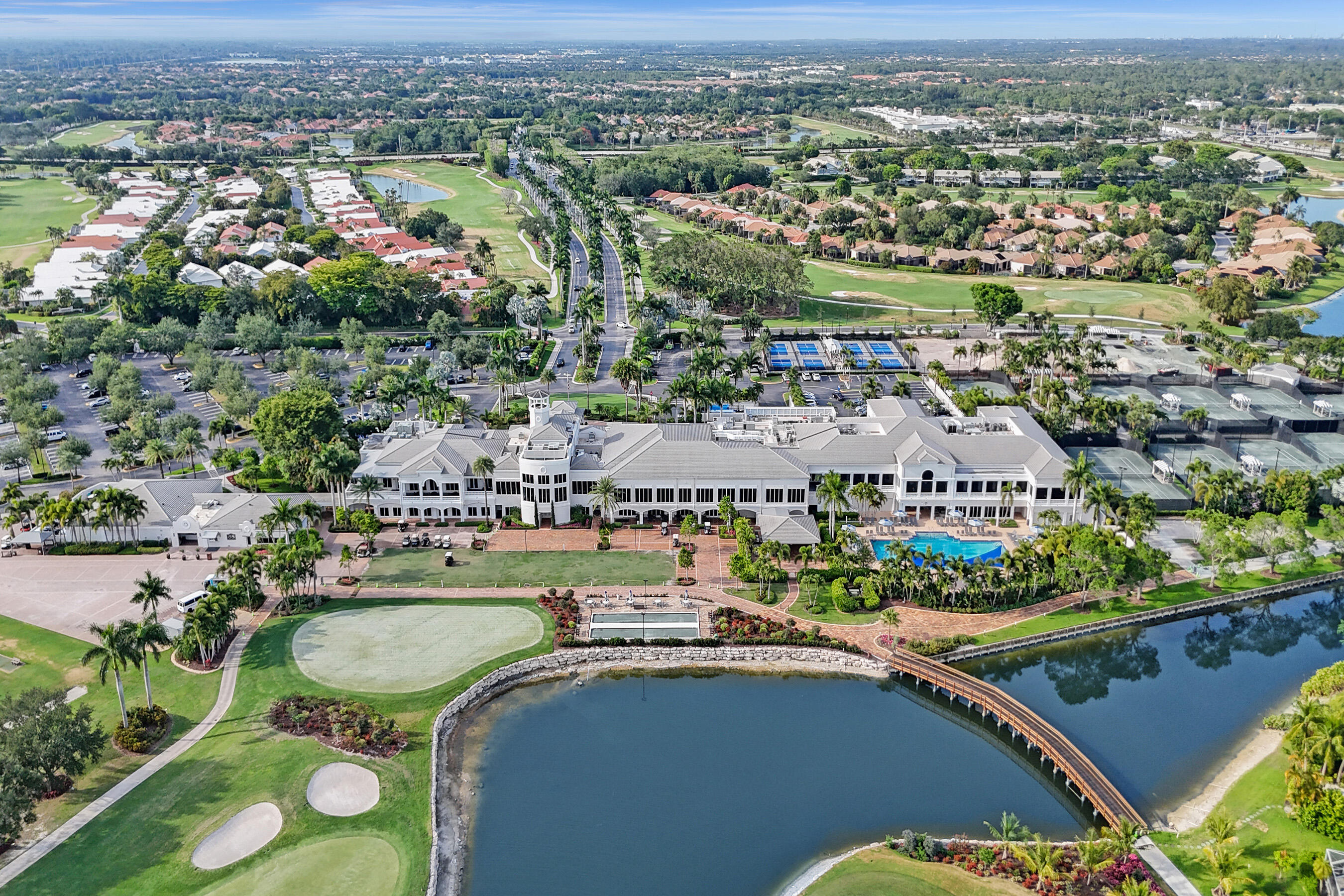 A perfect blend of refined elegance and relaxed comfort awaits in this true 3BR, 2BA condo with picturesque views of the newly renovated East Golf Course and serene lake.Spend your days living the country club dream, and come home to the spacious comfort this condo provides. Being on the 2nd floor offers not only spectacular views but also soaring ceilings that add light and volume to your home. The open floor plan lets you design the space your way, while the split-bedroom layout ensures privacy for all.The bathrooms have been luxuriously remodeled, with the primary suite boasting an oversized bedroom overlooking the golf course, and a spa-inspired bath with dual sinks, separate shower, and soaking tub. The 2nd bedroom features laminate flooring, while the 3rd bedroom doubles