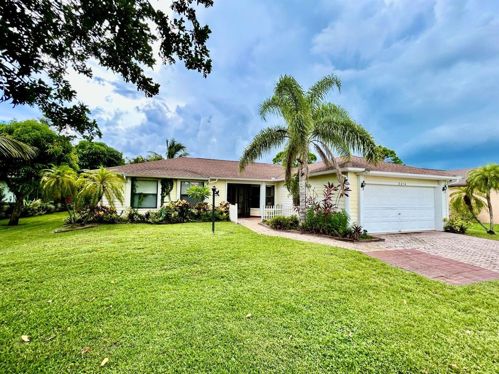 Photo of 2414 SE Fruit Avenue, Port St Lucie, FL 34952 (MLS # R10915149)