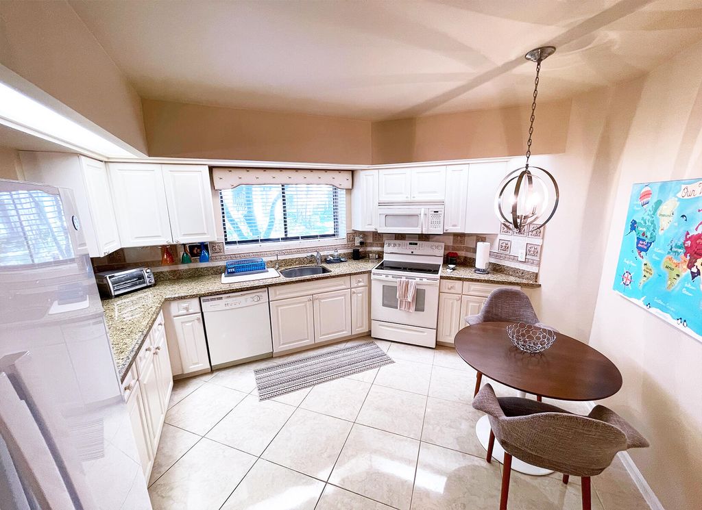 Photo of 1103 Duncan Circle #104, Palm Beach Gardens, FL 33418 (MLS # R10975755)