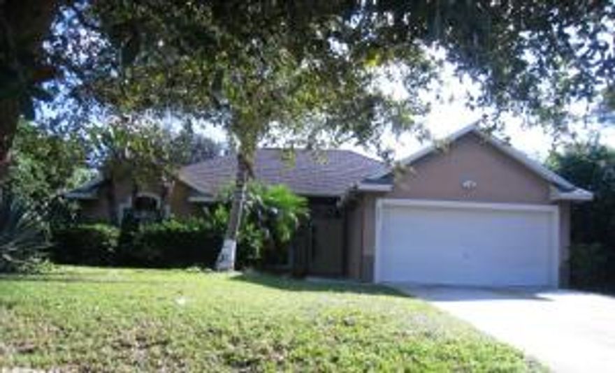 Perfect for commuters! Located 1 mile from the turnpike entrance and 3 miles from the I95. Well maintained CBS home with tile throughout, vaulted ceilings, and all kitchen appliances. Extensive use of crown molding and tile accents. Bright and cheery guest bedrooms with vaulted ceilings. Master suite has a roman tub and separate shower, linen closet and a walk in closet. Huge patio across the entire back of the home with access from the living room. New a/c in 2015, new water heater in 2014.