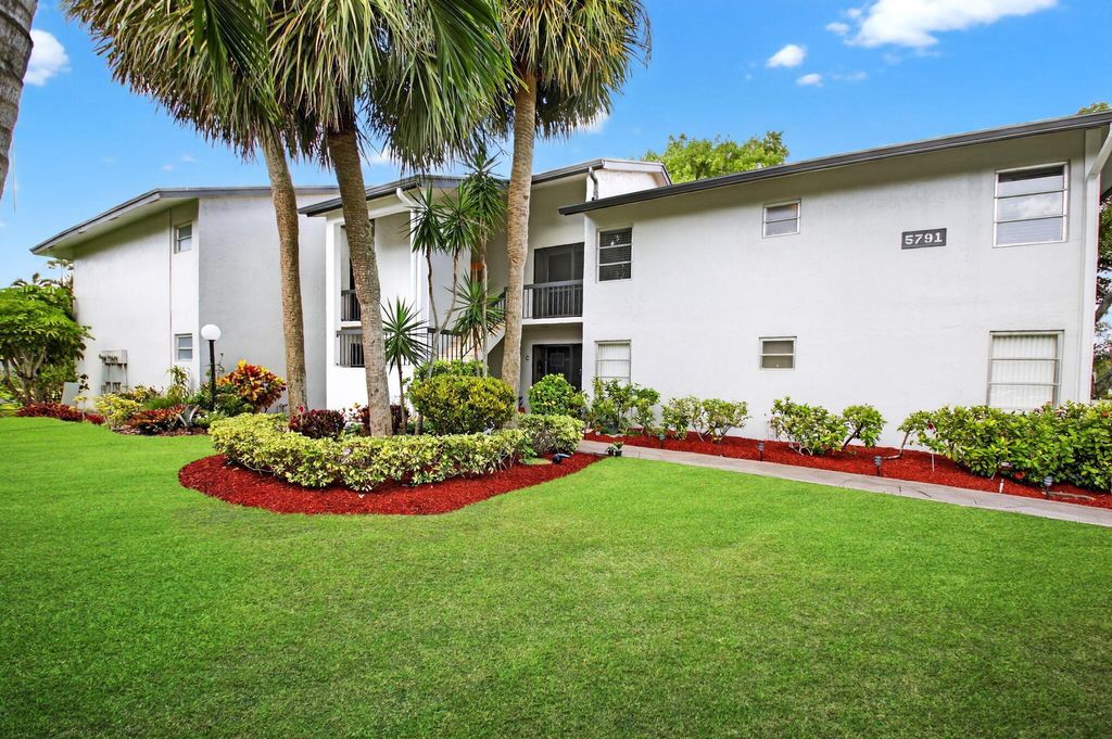 Photo of 5791 Spindle Palm Ct #Unit D, Delray Beach, FL 33484 (MLS # R11102213)