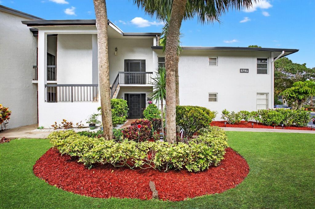 Photo of 5791 Spindle Palm Ct #Unit D, Delray Beach, FL 33484 (MLS # R11102213)