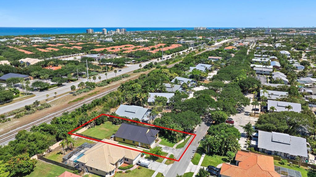 Photo of 500 N Cypress Drive, Tequesta, FL 33469 (MLS # R11104129)