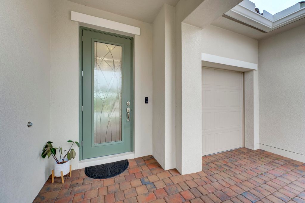 Photo of 12032 SW Marigold Avenue, Port Saint Lucie, FL 34987 (MLS # R10950445)