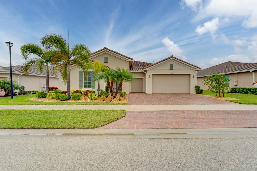 Photo of 12032 SW Marigold Avenue, Port Saint Lucie, FL 34987 (MLS # R10950445)