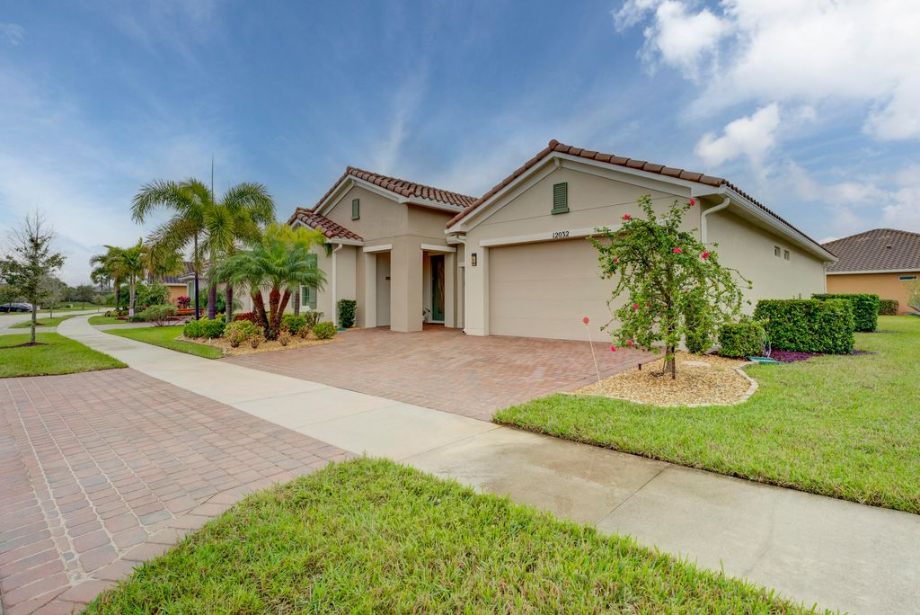 Photo of 12032 SW Marigold Avenue, Port Saint Lucie, FL 34987 (MLS # R10950445)