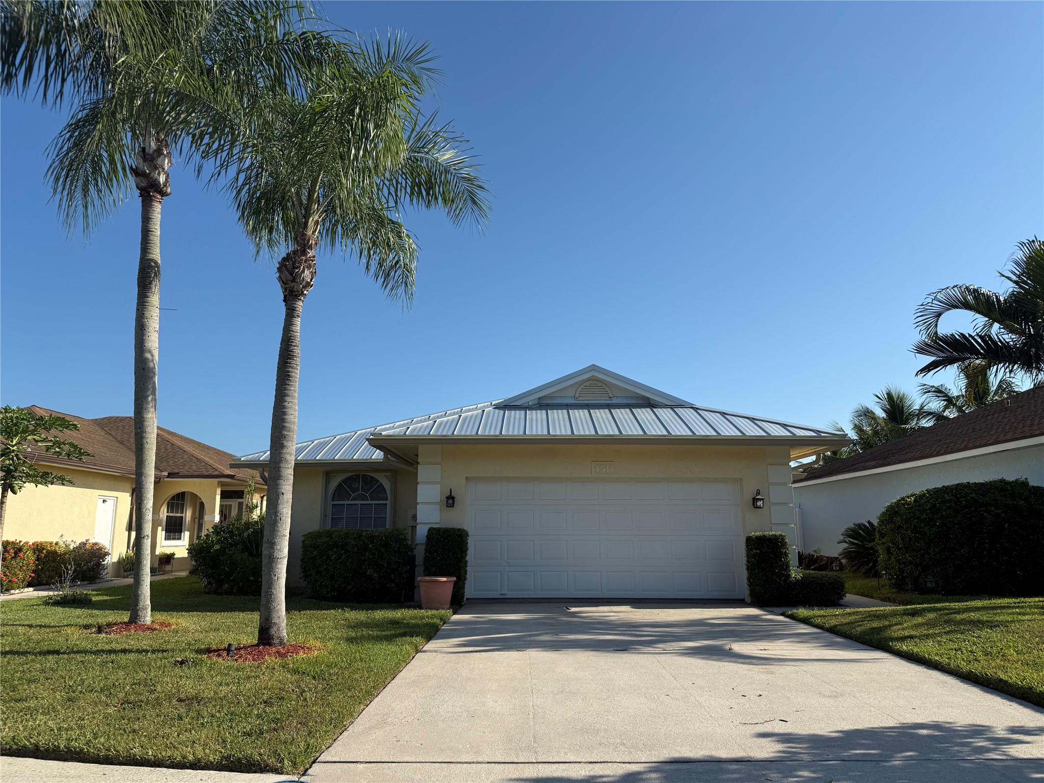 Immaculately maintained 3-bedroom, 2-bath home with a spacious 2-car garage, nestled in the heart of Jupiter’s desirable Sims Creek community. This inviting residence features an open-concept layout with abundant natural light, vaulted ceilings, and a thoughtfully designed floor plan. Enjoy indoor-outdoor living with a screened patio overlooking lush landscaping. The kitchen offers ample cabinetry and counter space, perfect for both daily living and entertaining. Located just minutes from beaches, top-rated schools, dining, and shopping, with access to a community pool and clubhouse. A true gem offering comfort, convenience, and the Florida lifestyle.