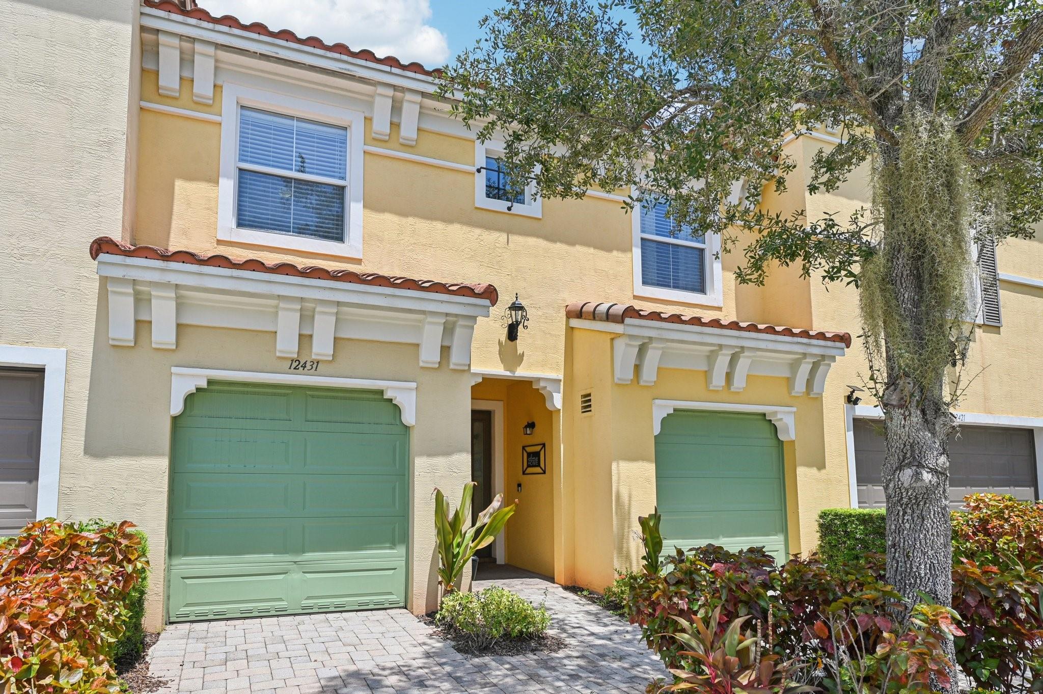 Beautifully updated 3BR/2.5BA townhome with split 2-car garage in the resort-style community of Artesia. The main level features tile flooring, a stylish dry bar, and a fully renovated kitchen with quartz countertops, subway tile backsplash, grey shaker cabinets, gas range, and stainless steel appliances, opening to a spacious dining and living area plus half bath. Upstairs, the primary suite offers vaulted tray ceilings, a walk-in closet and a spa-like bath with dual sinks, a soaking tub and a separate shower. Two additional bedrooms, a full bath, and laundry complete the second floor. Highlights include a 2-year-old A/C, impact windows/doors, a private fenced patio, and ample guest parking. Community amenities: 2 pools, fitness center, indoor basketball, tennis, pickleball and playground