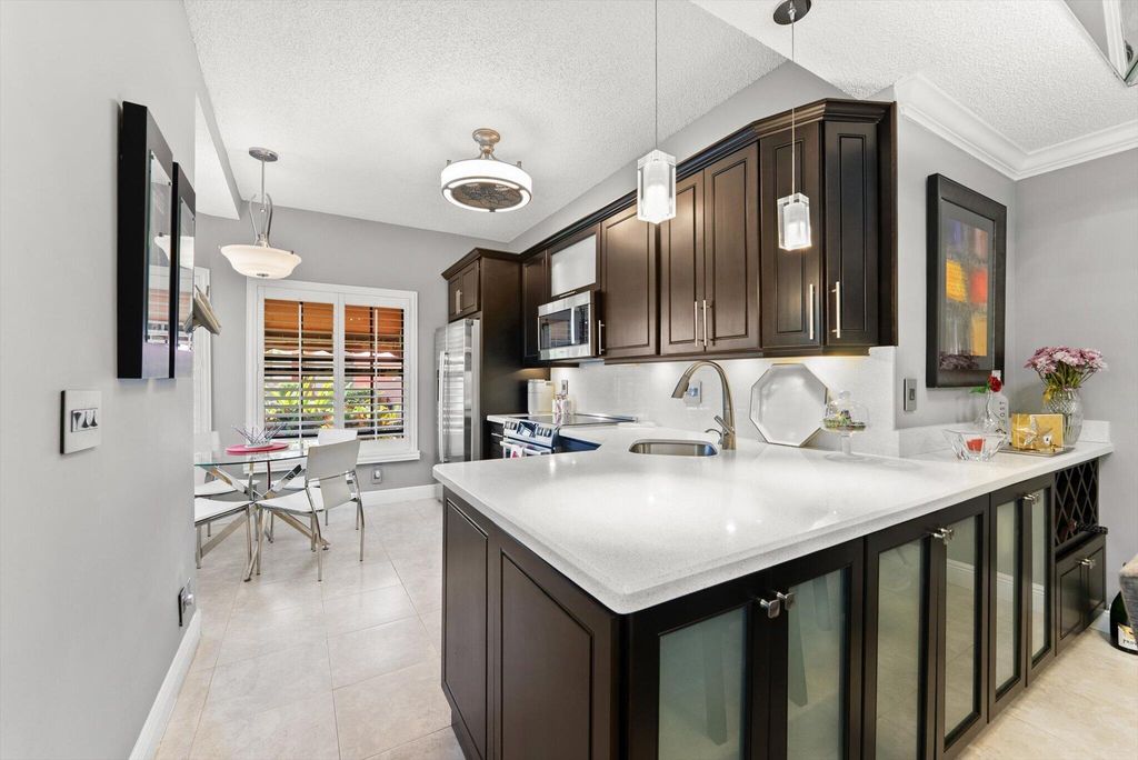 Photo of 7840 Lexington Club Boulevard #B, Delray Beach, FL 33446 (MLS # B26024008)