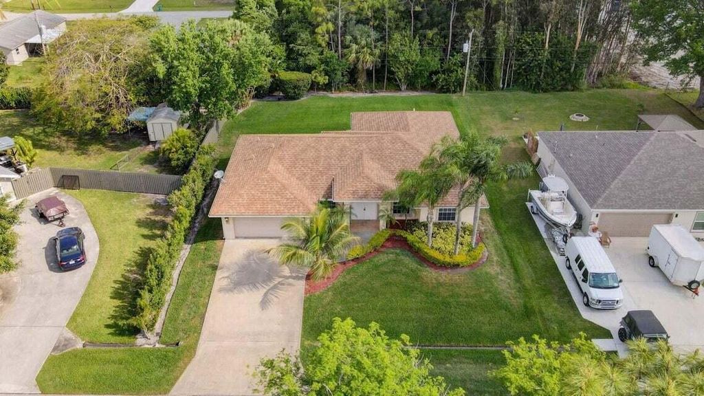 Photo of 1273 SW Granville Avenue, Port Saint Lucie, FL 34953 (MLS # R10995329)