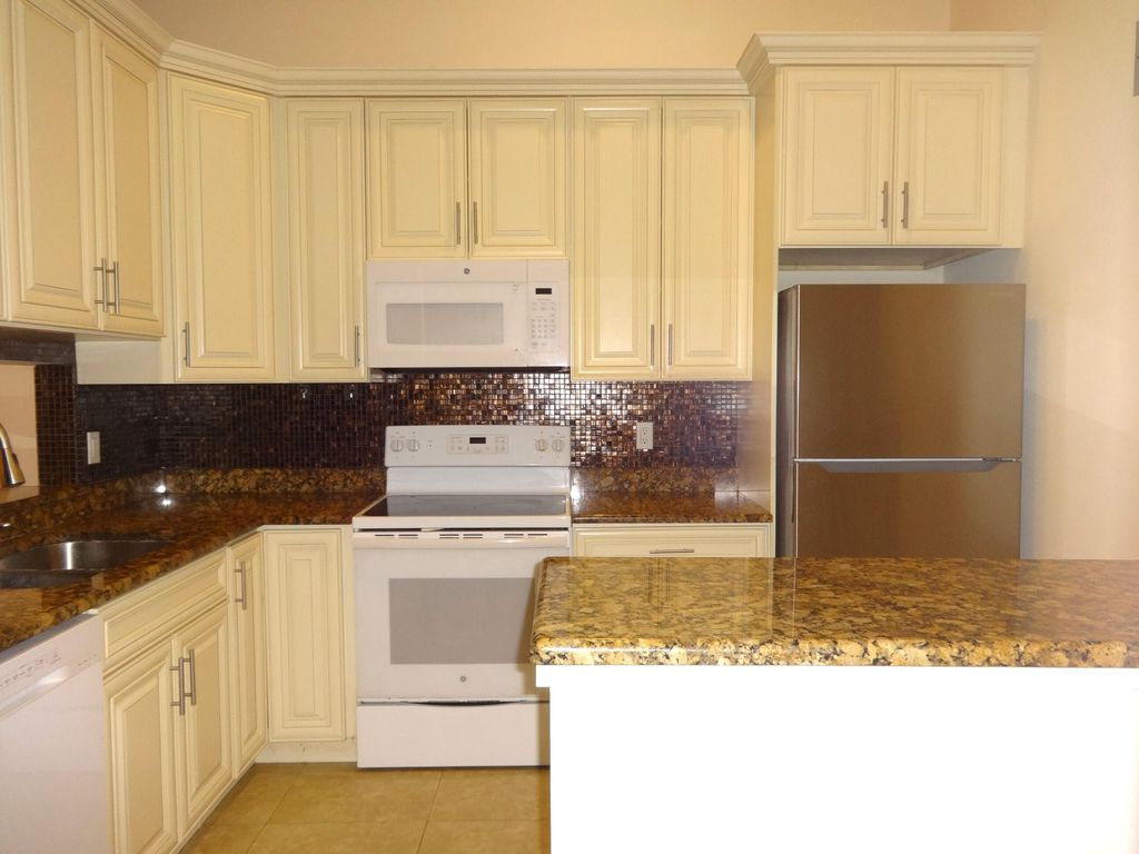 Photo of 6327 Chasewood Drive #H, Jupiter, FL 33458 (MLS # R10951223)