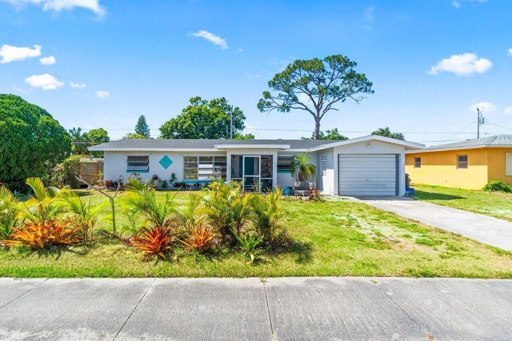 Photo of 310 Riomar Dr, Port Saint Lucie, FL 34952 (MLS # R10973845)