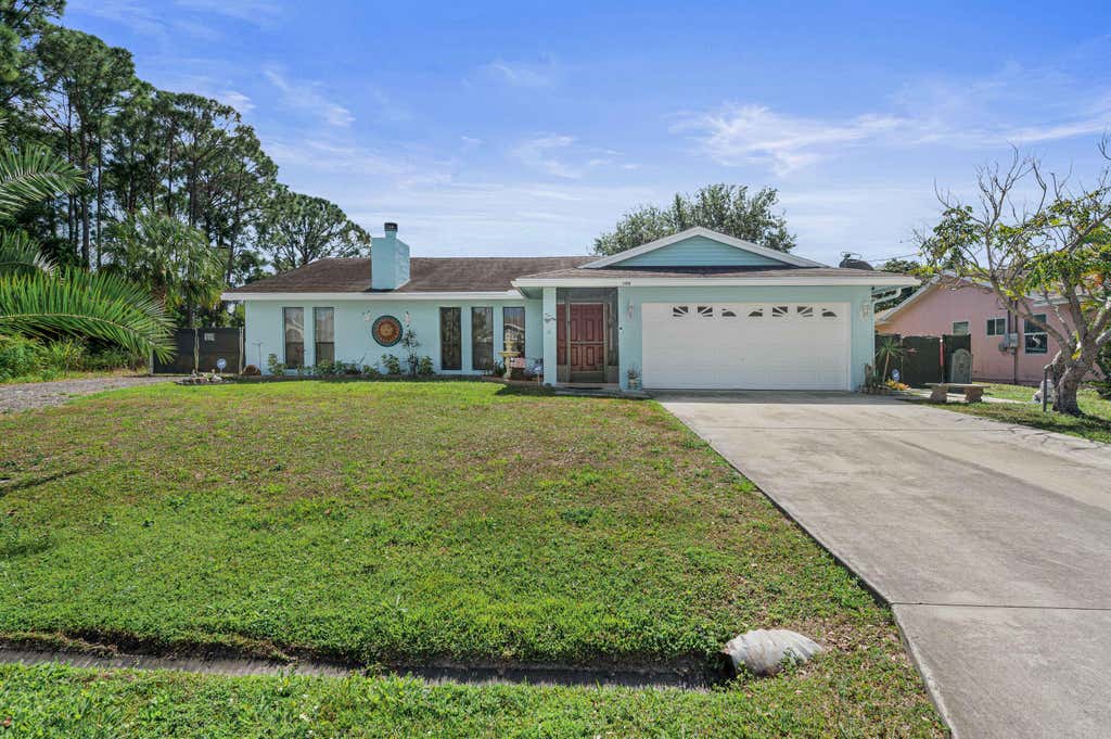 Photo of 108 SW Eyerly Avenue, Port Saint Lucie, FL 34983 (MLS # R10780834)