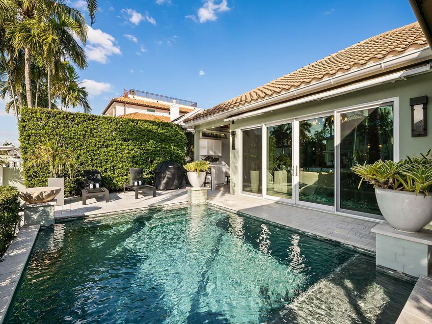 Waterfront turnkey villa nestled in the sought after Las Olas neighborhood of Idlewyld with 3 bedrooms, 2.1 baths and den. Offering a 50ft dock and direct ocean access just mintutes to the Inlet. Renovated to provide light filled open living spaces with a resort style heated pool and backyard perfect entertaining family and friends. The Chef's kitchen boasts top of the line appliances and a stunning blue agate island. The spacious primary suite includes sitting area, spa bath with vaulted ceilings and a stone accent wall. Lutron, Sonos and Ring Alarm systems.  Enjoy close proximity to the sparkling Atlantic ocean, beaches, upscale dining & shopping along with easy access to all major travel corridors. The perfect place to relax in the coastal vibes of South Florida.