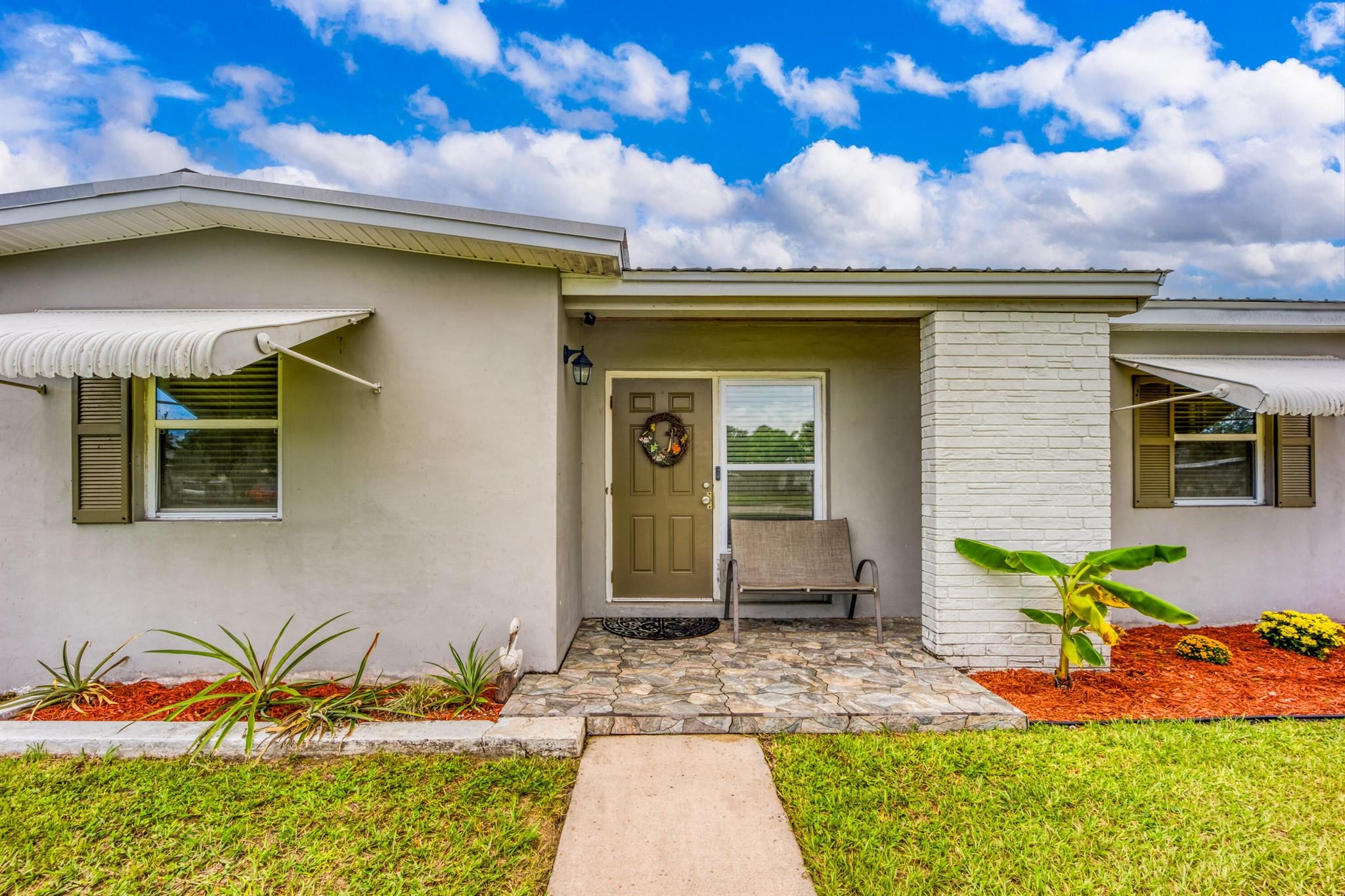 Welcoming, Spacious, CBS Home on a large CORNER LOT. Fully Fenced all around big back yard for privacy. Room for RV, Boat, Pool and Toys in a separate fenced area too. Sidewalks on both sides of house. Updated windows, Metal Roof, Granite in kitchen, tankless water heater and more! Make an appointment to see this gem today and come enjoy the Florida lifestyle!
