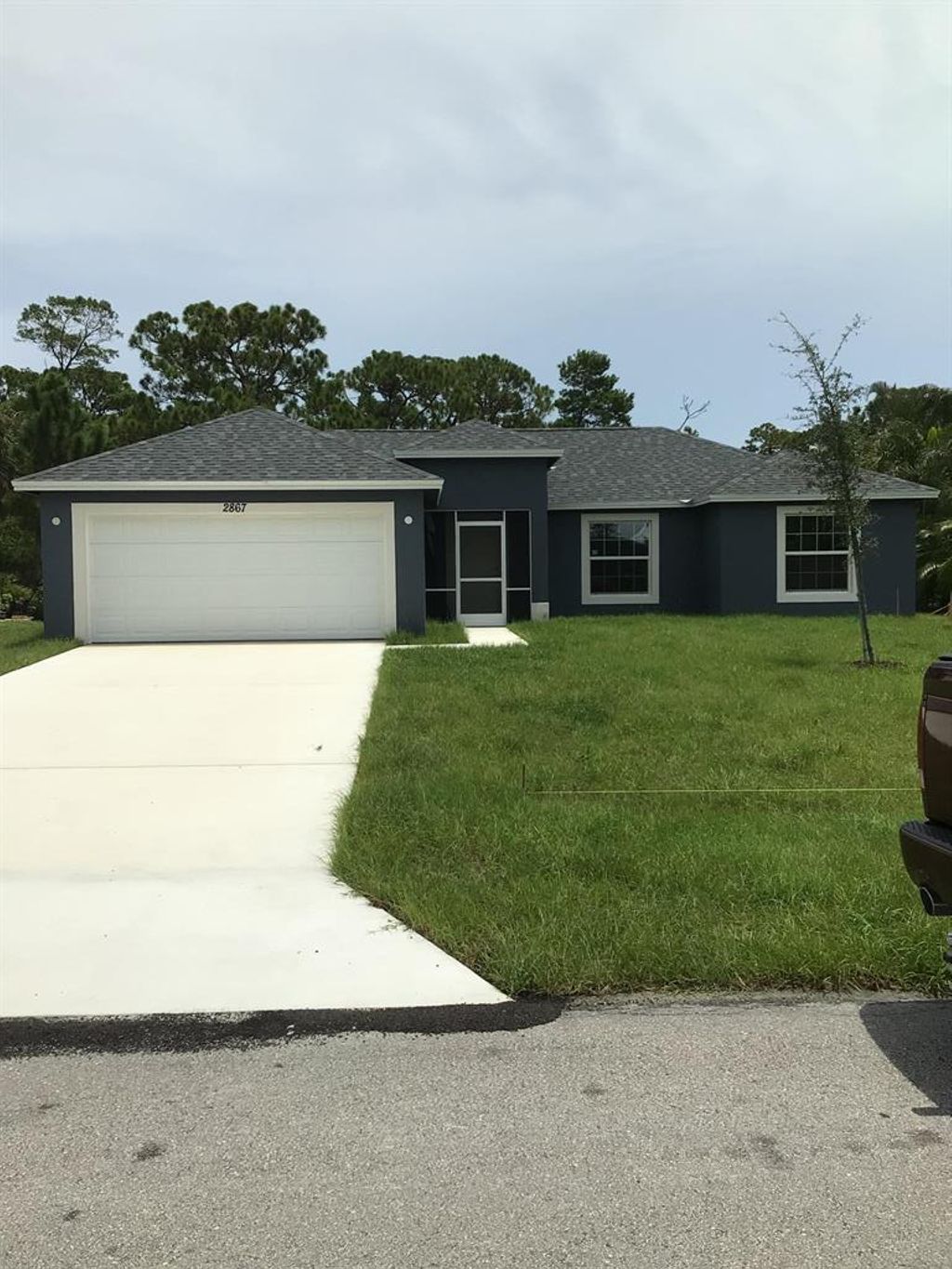 Photo of 466 SW Lakota Avenue Ave, Port St Lucie, FL 34953 (MLS # R10739040)