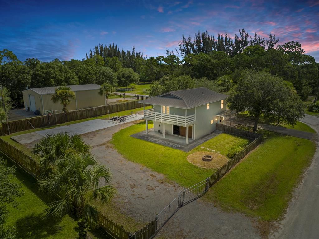 Photo of 8670 Jay Gardens Lane Ln, Fort Pierce, FL 34945 (MLS # R10814463)