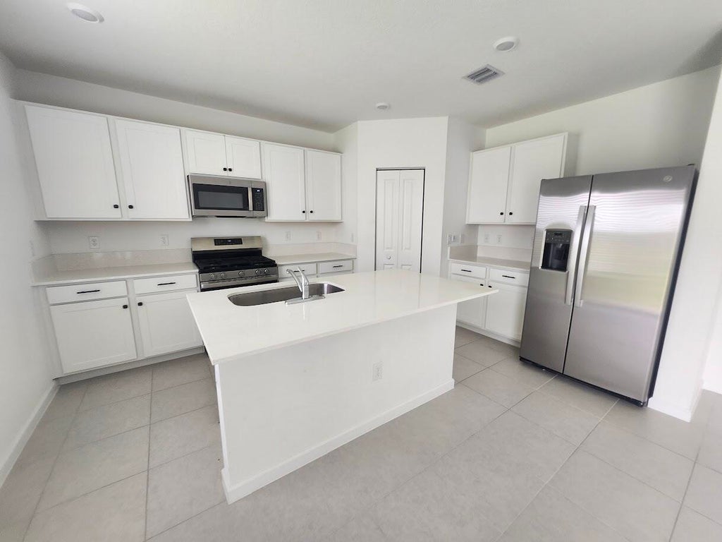 Photo of 5944 NW Mangrove Drive, Port Saint Lucie, FL 34987 (MLS # B26024626)