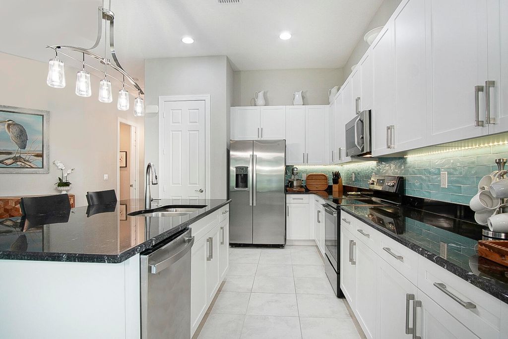 Photo of 2652 Conifer Drive, Fort Pierce, FL 34951 (MLS # R11125102)