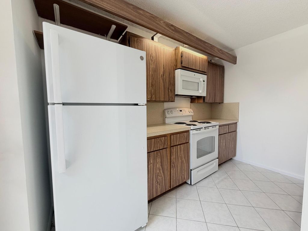 Photo of 5512 55th Way, West Palm Beach, FL 33409 (MLS # B26019311)