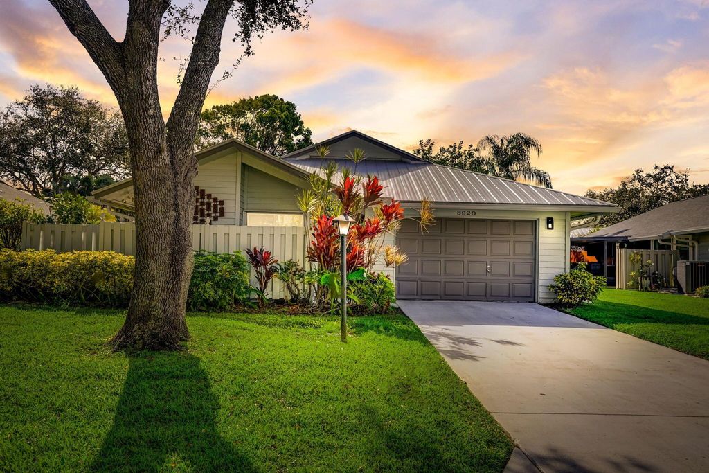 Photo of 8920 SE Eaglewood Way, Hobe Sound, FL 33455 (MLS # R10936359)