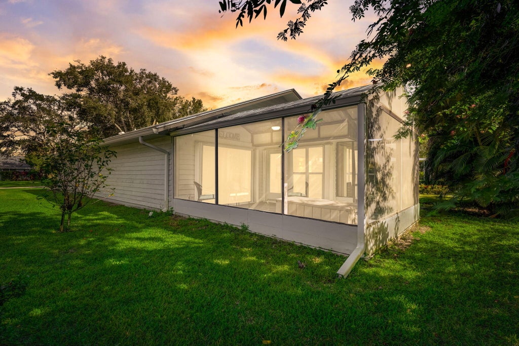 Photo of 8920 SE Eaglewood Way, Hobe Sound, FL 33455 (MLS # R10936359)