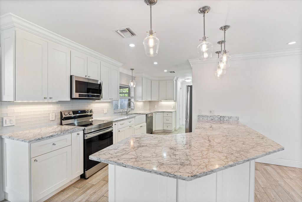 Photo of 799 NW 7th Drive, Boca Raton, FL 33486 (MLS # R11108018)