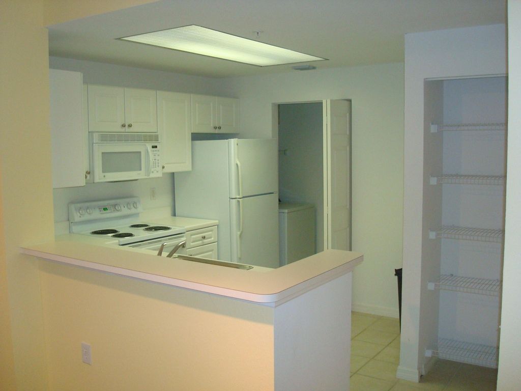 Photo of 2802 Sarento Place #115, Palm Beach Gardens, FL 33410 (MLS # R11017516)