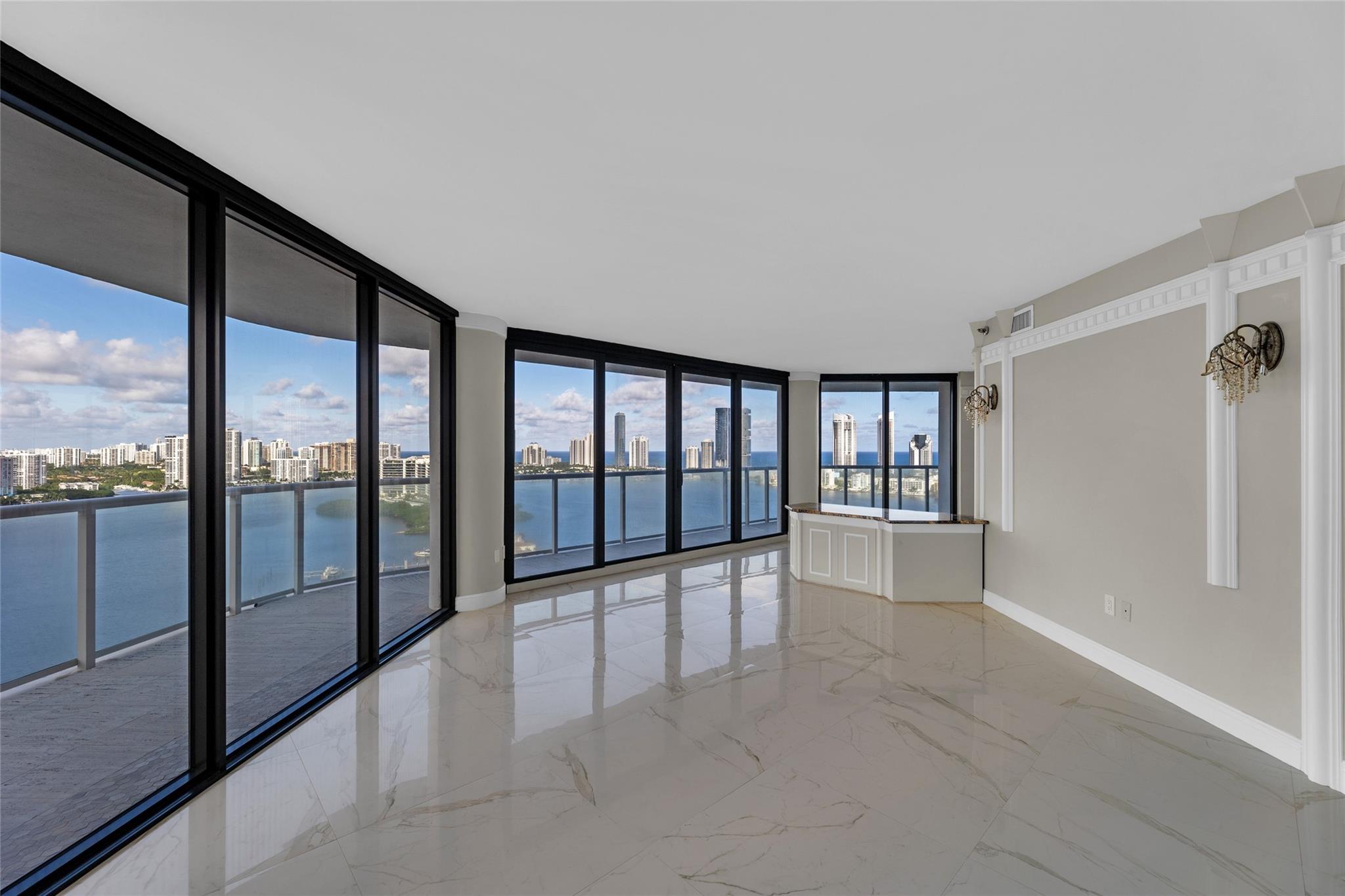 Experience breathtaking views of the Intracoastal and ocean from every room. This spacious condo features new floor-to-ceiling hurricane impact windows and elegant marble flooring. For a distinctive opportunity, the neighboring unit 2607 is also available for purchase offering the potential to merge both into a generously sized residence with minimal effort. The Williams Island community offers a resort style experience, featuring a 27,000 sqft spa with an indoor pool, tennis & pickleball courts, dog park, playground, on-site restaurants, an outdoor pool with food and drink service, marinas, walkways along the Intracoastal & 24 hr gated security. 4000 building is undergoing a $32M renovation! The upgrades include a new pool deck, lobby, entrance, hallways, elevators & glass balconies.