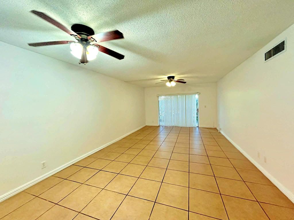Photo of 2960 Riverside Drive #113-2, Coral Springs, FL 33065 (MLS # B26023413)