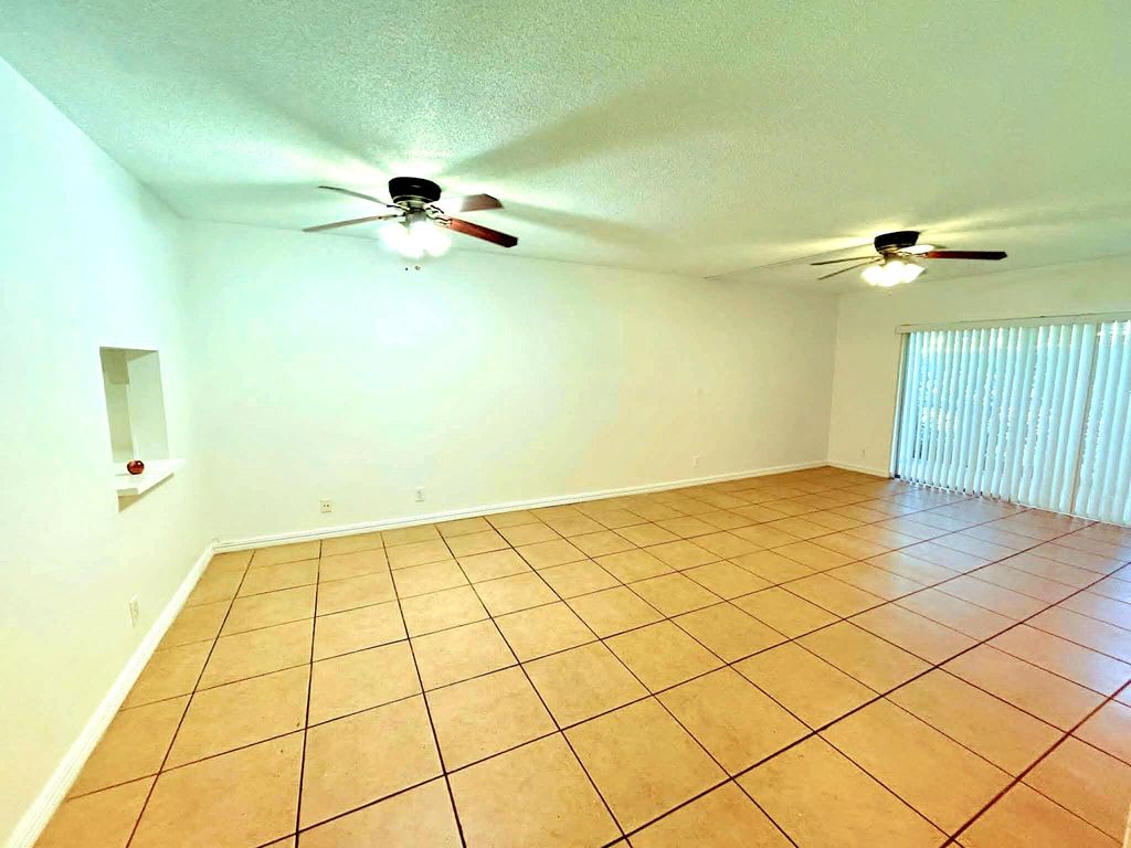 Photo of 2960 Riverside Drive #113-2, Coral Springs, FL 33065 (MLS # B26023413)