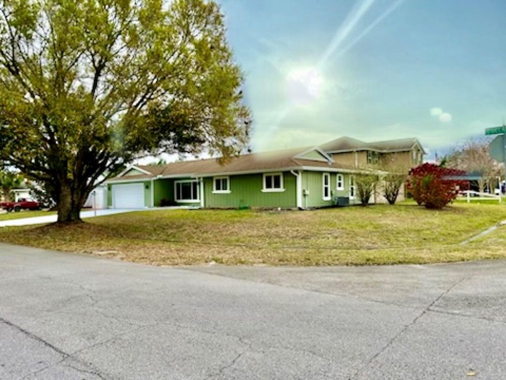 Photo of 682 SE Delancey Lane, Port Saint Lucie, FL 34984 (MLS # R10960045)