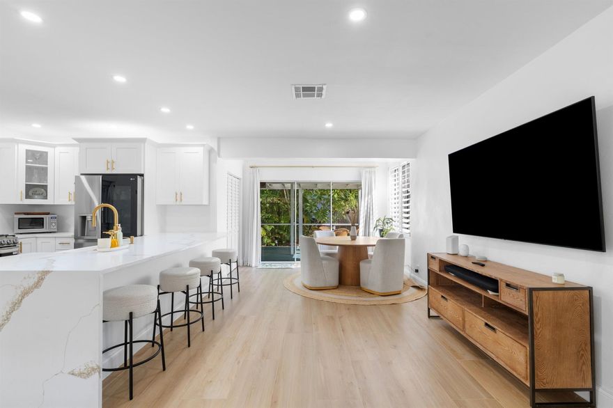 Welcome to 314 S M Street, a beautifully renovated 2-bedroom, 3-bathroom home perfectly situated in the heart of Lake Worth Beach, Florida--where coastal charm and walkable living come together in one of South Florida's most vibrant communities.Step inside to find a bright, open-concept living space filled with natural light and stylish upgrades throughout. The modern kitchen boasts quartz countertops, stainless steel appliances, and custom cabinetry--ideal for entertaining or casual dining. Each bedroom features its own updated en-suite bath, complemented by a third full bathroom for guests or flexible living.Out back, unwind in your private outdoor retreat featuring a screened-in porch that's perfect for morning coffee or evening cocktails, plus a relaxing hot tub to soak away the