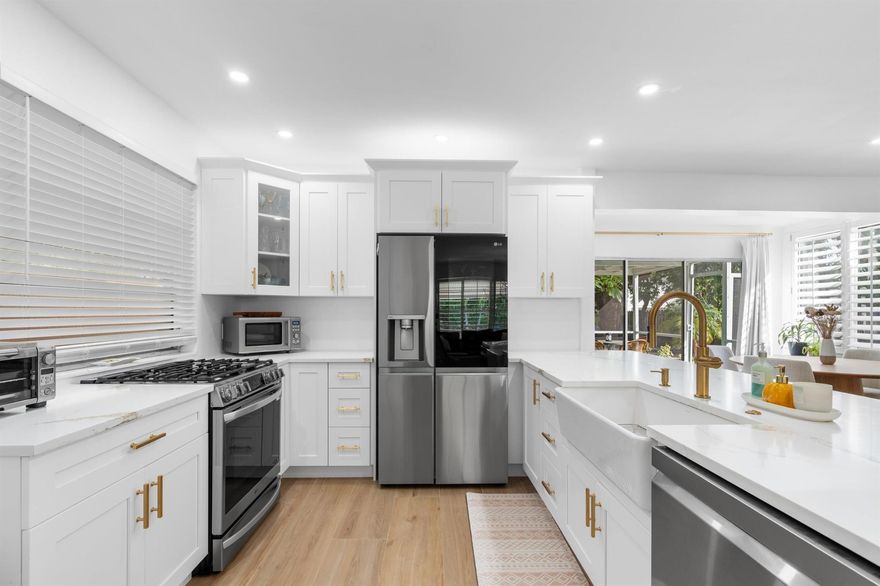 Welcome to 314 S M Street, a beautifully renovated 2-bedroom, 3-bathroom home perfectly situated in the heart of Lake Worth Beach, Florida--where coastal charm and walkable living come together in one of South Florida's most vibrant communities.Step inside to find a bright, open-concept living space filled with natural light and stylish upgrades throughout. The modern kitchen boasts quartz countertops, stainless steel appliances, and custom cabinetry--ideal for entertaining or casual dining. Each bedroom features its own updated en-suite bath, complemented by a third full bathroom for guests or flexible living.Out back, unwind in your private outdoor retreat featuring a screened-in porch that's perfect for morning coffee or evening cocktails, plus a relaxing hot tub to soak away the