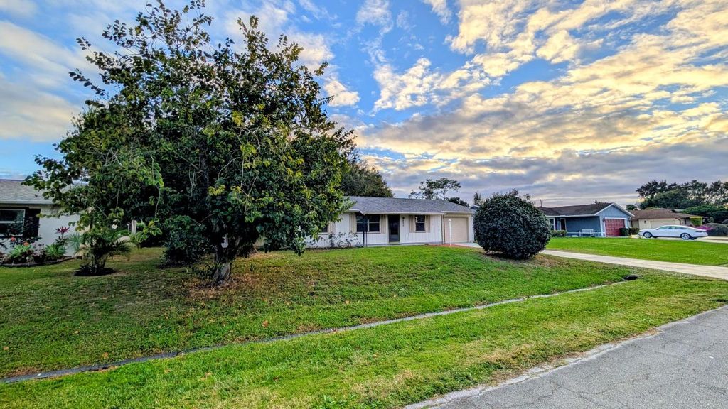 Photo of 522 NW La Brea Avenue, Port Saint Lucie, FL 34983 (MLS # R11149744)