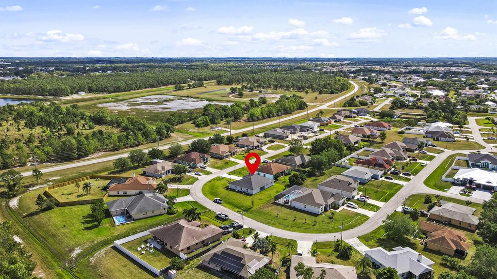 Photo of 5826 NW Dooley Circle, Port Saint Lucie, FL 34986 (MLS # R10947154)