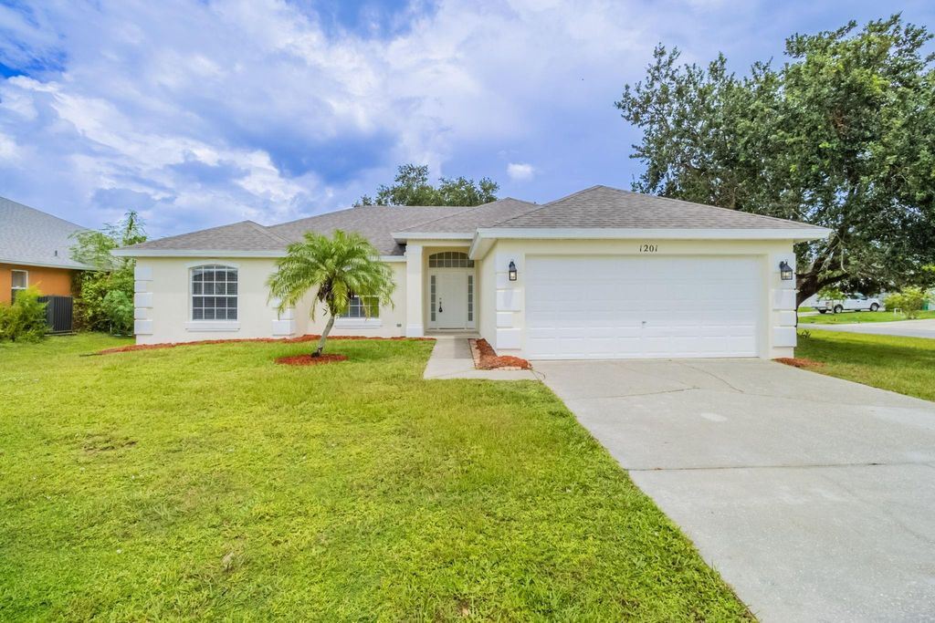 Photo of 1201 SW Minyo Avenue, Port Saint Lucie, FL 34953 (MLS # F10525230)