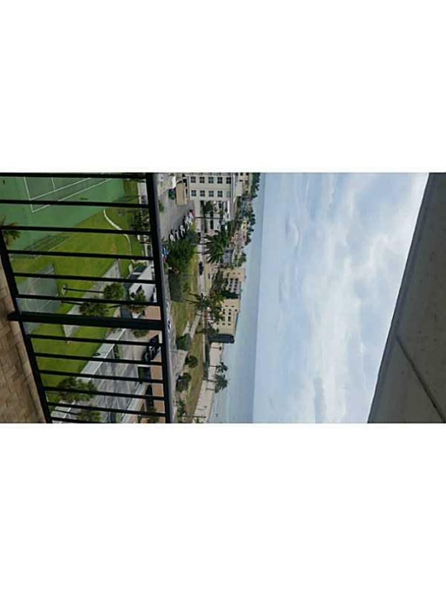 completely remodeled, wood grain tile floors, granite counters, stainless appliances, remodeled baths,spectacular ocean view,two pools ,your own pizza shop, walk out to beach. large price reduction