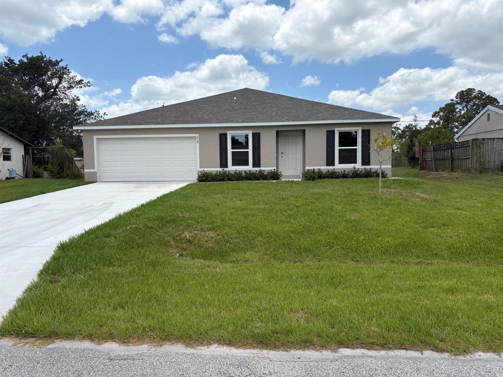 Photo of 318 SE Dalva Avenue, Port Saint Lucie, FL 34984 (MLS # R11085763)